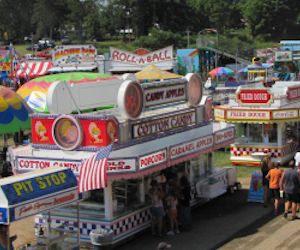 Vendors and the midway at the Afton Fair